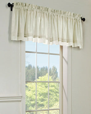 Rhapsody Lined Tailored Valance hanging on a curtain rod