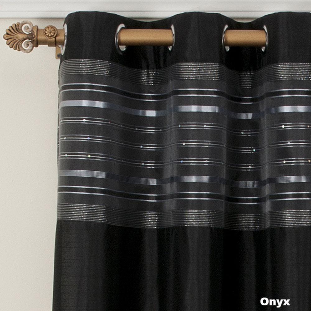 close up shot of Onyx Fiesta Faux Silk Grommet Top Panel fabric and grommets
