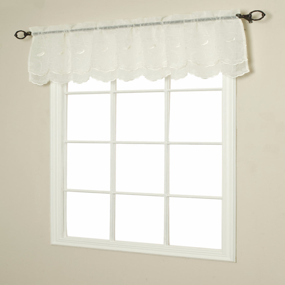 Commonwealth Hathaway Double Scalloped Valance hanging on a decorative rod