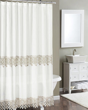 Ivory Lillian Macramé Band Fabric Shower Curtain hanging on a shower curtain rod