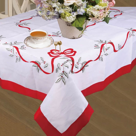 White Euro Seasonal Bows Fabric Tablecloth over a table