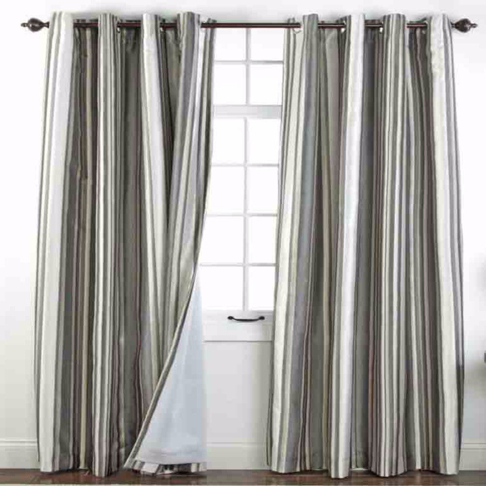 Serene Striped Grommet Top Panels hanging on a decorative curtain rod