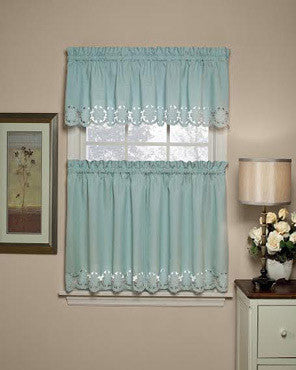 Misty Blue Taylor Kitchen Valance and Tier Curtains hanging on a curtain rod 