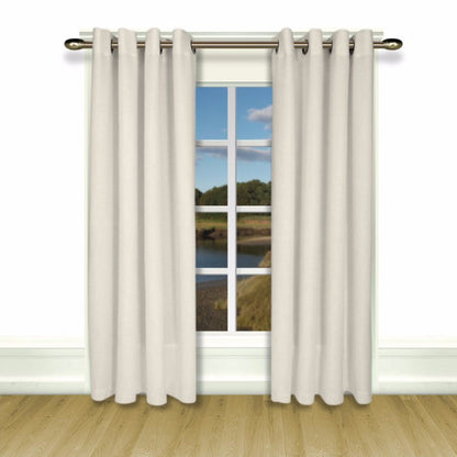 White New Castle Grommet Top Panel hanging on a decorative curtain rod